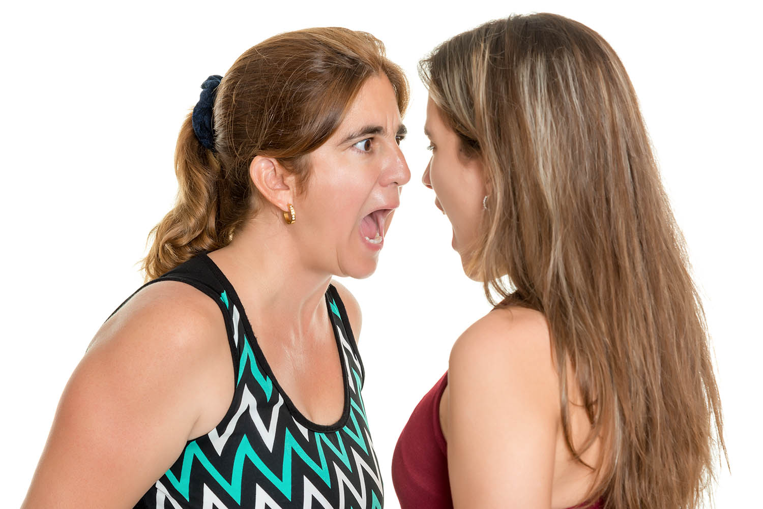 Angry mother and her teenage daughter yelling at each other  – I